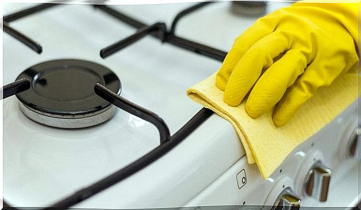 Stove being cleaned