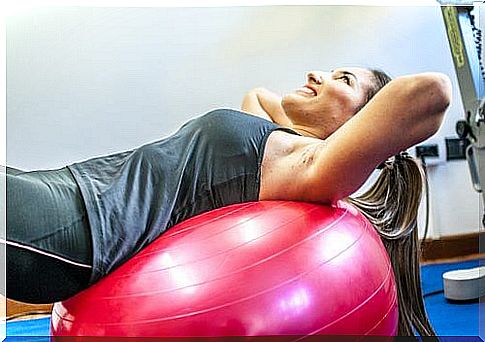 Woman using exercise ball