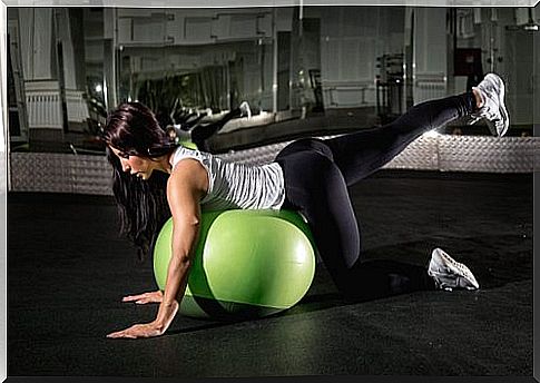 Woman using exercise ball