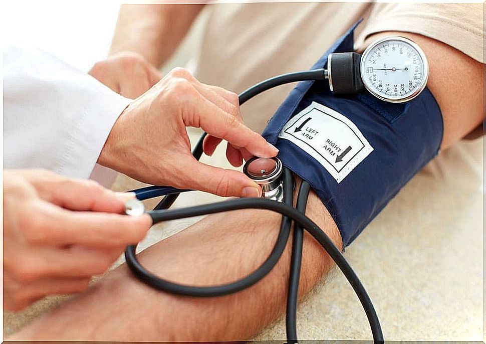 Person father measures his blood pressure