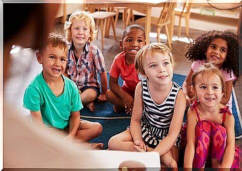 Smiling children in classroom illustrate the best school