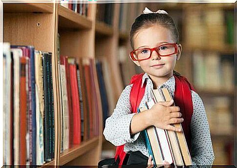 Girl with books at library