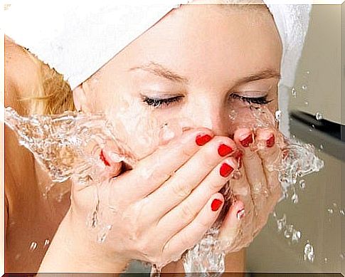 Woman washing face