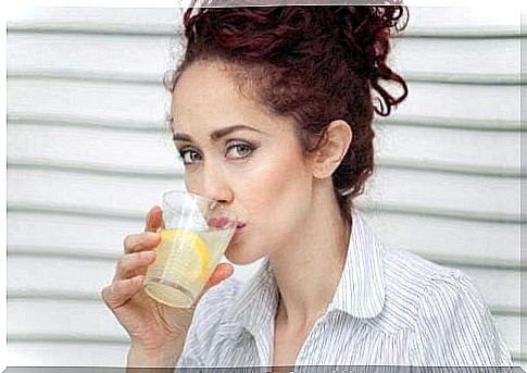 woman drinking lemonade