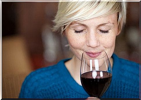 Woman drinking red wine