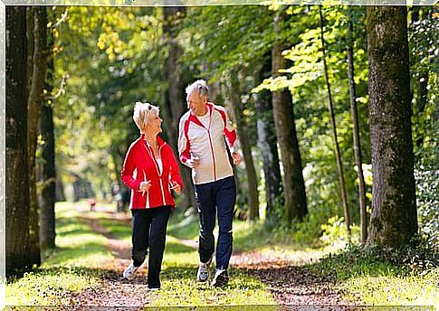 Elderly couple running