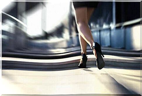 Woman walks in high heels