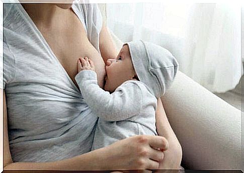 Woman breastfeeding baby