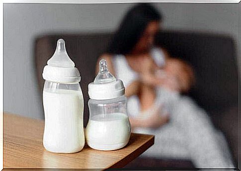 Baby bottles on the table symbolize weaning the baby